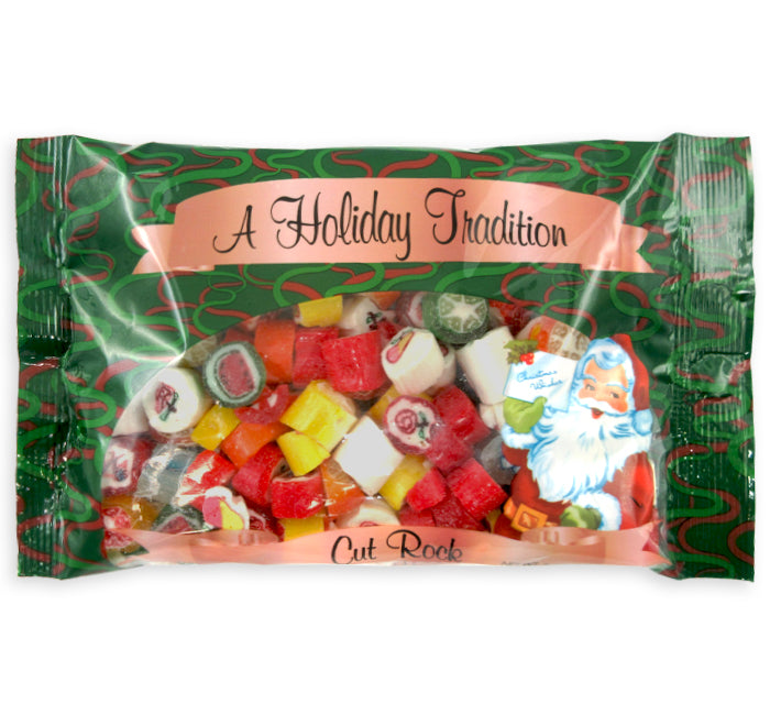 Packaged holiday candy with colorful cut rock candy and a Santa Claus design on a green and red background.